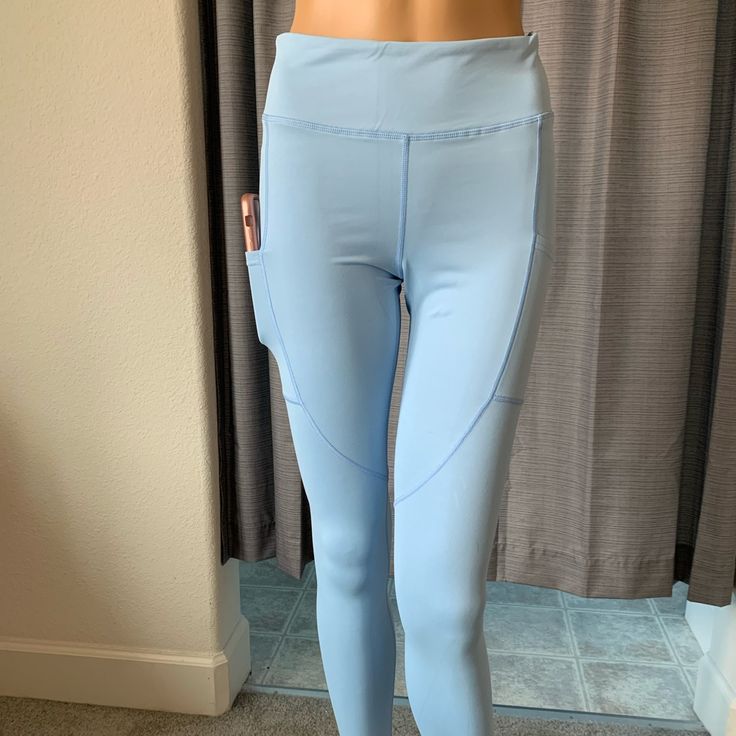 High Waisted, Super Comfortable Leggings With A Pocket On Each Side, Big Enough For Phone. Great For Gym Wear, Active, Lounging, Yoga, You Name It. 90% Polyester 10% Spandex Xsmall 25 X 30 X 22 X 32 Small 28 X 34 X 22 X 32 Medium 30 X 36 X 23 X33 Large 32 X 38 X 24 X34 Blue Stretch Bottoms With Side Pockets, Blue Yoga Activewear With Side Pockets, Blue Activewear With Side Pockets For Yoga, Blue Stretch Activewear With Side Pockets, High Rise Solid Leggings With Pockets, Blue Activewear With Side Pockets For Workout, Blue Workout Activewear With Side Pockets, High Waist Light Blue Sports Bottoms, High Waist Blue Leggings With Elastic Waistband