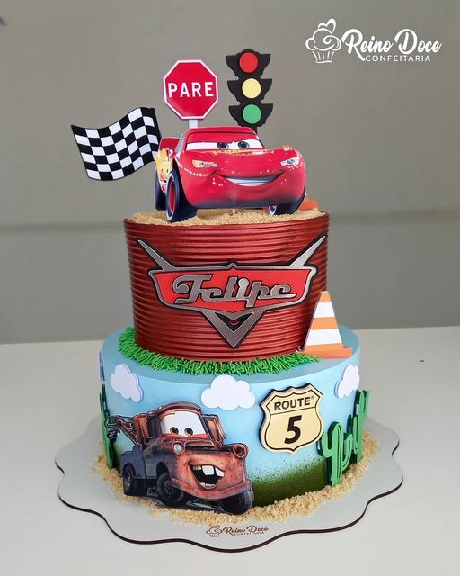 a birthday cake made to look like cars