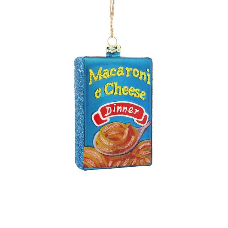 a blue ornament hanging from a string with food on it's side