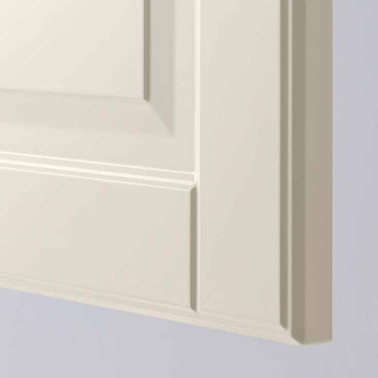 a white cabinet with two doors on each side