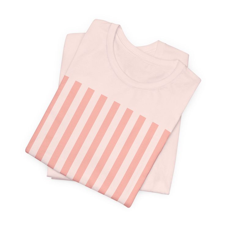 Introducing our Coral Pink Stripes Shirt, a feminine and chic addition to your wardrobe. Made with pretty pink and white vertical stripes, this classic t-shirt brings a cute and stylish touch to any casual outfit. This classic unisex jersey short sleeve tee fits like a well-loved favorite. These soft cotton t-shirts have-ribbed knit collars to bolster shaping. The shoulders are tapered for a better fit over time. Dual side seams hold the garment's shape for longer. .: Made with 100% Airlume comb Pink Tshirt, Vertical Stripes, Pink Stripes, Coral Pink, Pretty Pink, Leisure Wear, Striped Shirt, Pink And White, Kids Dress