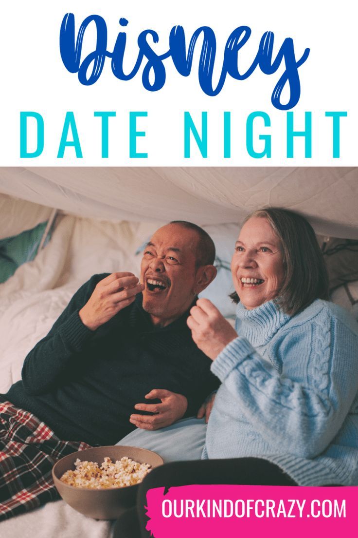 an older man and woman eating popcorn in bed with the text disney date night