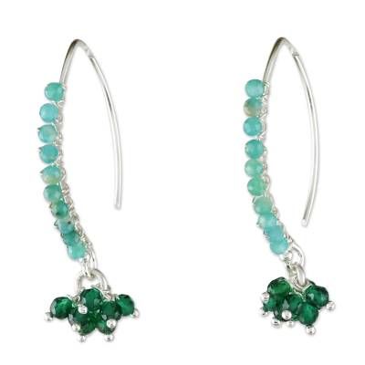 Designed by Thai artisan Sareeyakarn these dancing cluster earrings display the beauty of amazonite. Long hooks of sterling silver are beaded with the cool gem and petite green glass beads dangle below. Green Gemstone Bead Drop Earrings, Sterling Silver Jewelry With Green Dangling Beads, Sterling Silver Gemstone Beads Dangle Earrings, Sterling Silver Gemstone Bead Earrings, Sterling Silver Dangle Earrings With Gemstone Beads, Sterling Silver Earrings With Round Gemstone Beads, Green Sterling Silver Beaded Earrings With Round Beads, Earrings Display, Bar Jewelry