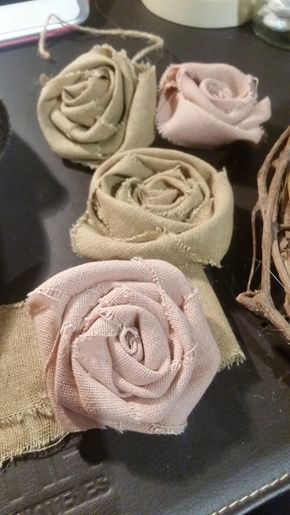 several pieces of fabric with flowers on them