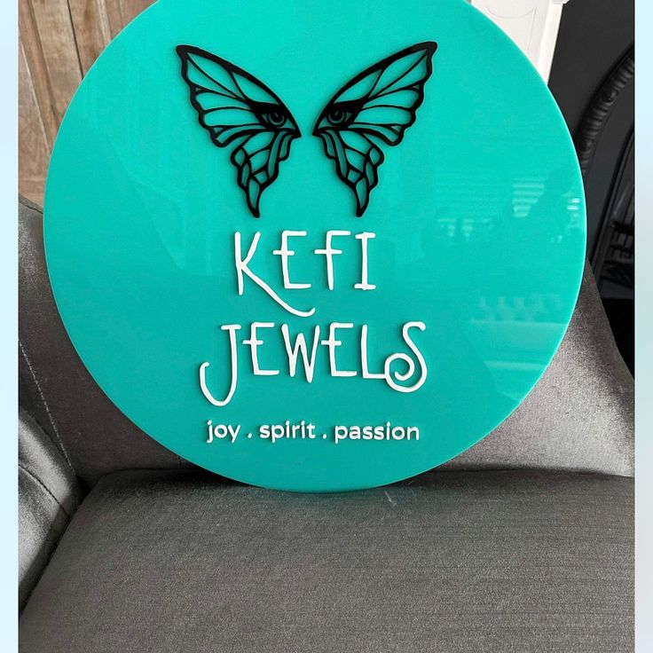 a sign that says keffi jewels joy spirit passion on the back of a chair