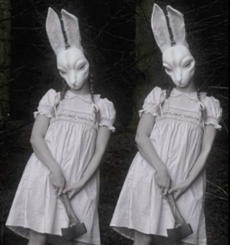 two girls wearing bunny ears and dresses with hammers