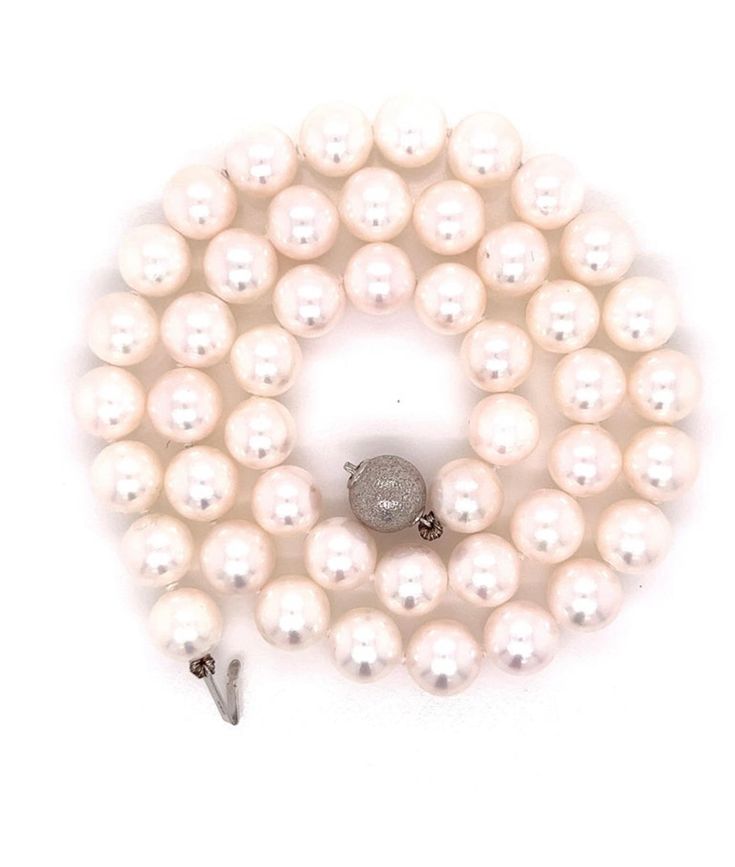 Enhance your classic style with our Japanese Cultured Akoya Pearl Necklace. The Akoya pearl is a saltwater cultured pearl from the Akoya oyster. Akoya are considered to be the classic pearl used for necklaces and other pearl jewelry, with perfect round shapes, bright mirror-like luster and neutral colors, and relative rarity compared to freshwater pearls. Featuring 8.5-9 mm luminous pearls in a range of white to light rose, these pearls are considered "clean," making them high-quality. The 17" strand is finished with a 14K white gold ball clasp. An unbeatable value for stunning pearls. Pearls date back to 2300 BC as a symbol of luxury and elegance. Audrey Hepburn transformed the once exclusive gem to an essential accessory in every woman's wardrobe and have a serious staying power and can Bright Mirror, Akoya Pearl Necklace, Light Rose, Akoya Pearls, Rose Lights, Women's Wardrobe, Japanese Culture, Audrey Hepburn, Pearl Jewelry