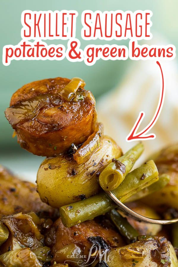 there is a spoon full of potatoes and green beans on top of some meats