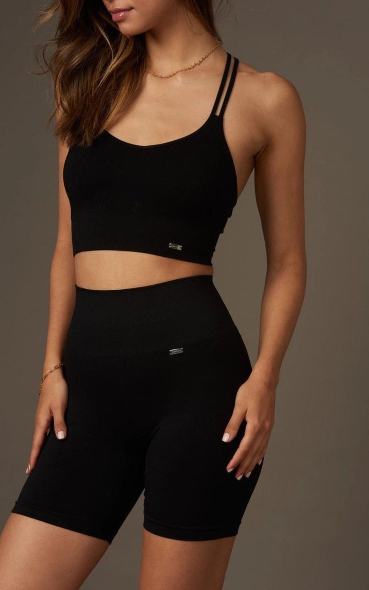 Achieve the perfect second skin feel with our High-Waisted Push-Up Biker Shorts, designed to provide a seamless, high-waisted fit that gently sculpts the abdomen without constricting. The rear ruching creates a flattering push-up effect, while the wide, elastic-free hem at the leg openings prevents the unflattering cut-off effect. Crafted from premium recycled polyamide, this durable fabric offers a peach-like touch and a subtle sheen. Product Details: High-waisted push-up shorts with second skin effect Reinforced seamless high waist for gentle abdominal support Rear ruching for a flattering push-up effect Wide, elastic-free hem at the leg openings Premium recycled polyamide fabric with a peach-like touch and subtle sheen Biker Shorts Black, Kids Garments, Black High Waisted Shorts, Plus Size Party Dresses, Knit Bottom, Shoe Inspiration, Yoga Activewear, Active Wear Leggings, Sweaters Knitwear