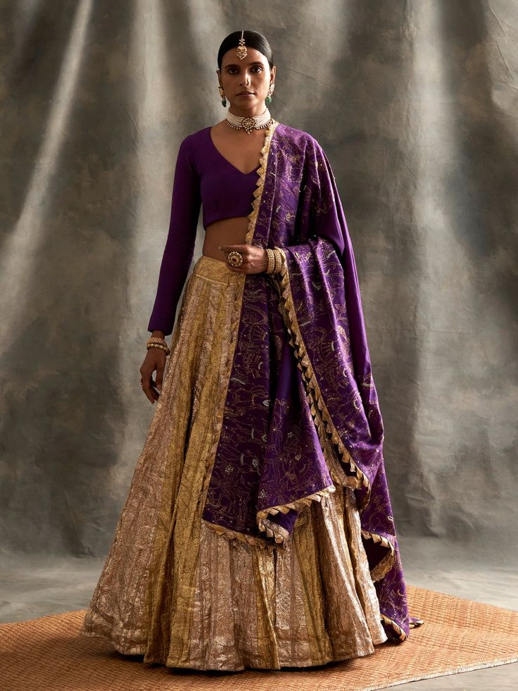 Editor's Note Purple Linen Blouse With A Silver Gold Panelled Lampi Lehenga. The Dupatta Is In Linen With Customised khari Block And Intricate Zardosi Dabka Embroidery. Fabric: Linen Color: Purple, gold Care: Dry Clean Only About the Designer Itrh makes a high-end luxury Indian ethnic wear made using exquisite and endangered age-old crafts such as kalamkari, madhubani, chikankari, zardozi, and gota weaving. The focus of the house is to cherish the beauty of handcrafted luxury designer wear. Dabka Embroidery, Golden Lehenga, Gold Lehenga, Purple Linen, Organza Lehenga, Indian Outfits Lehenga, Desi Clothes, Indian Couture, Linen Color