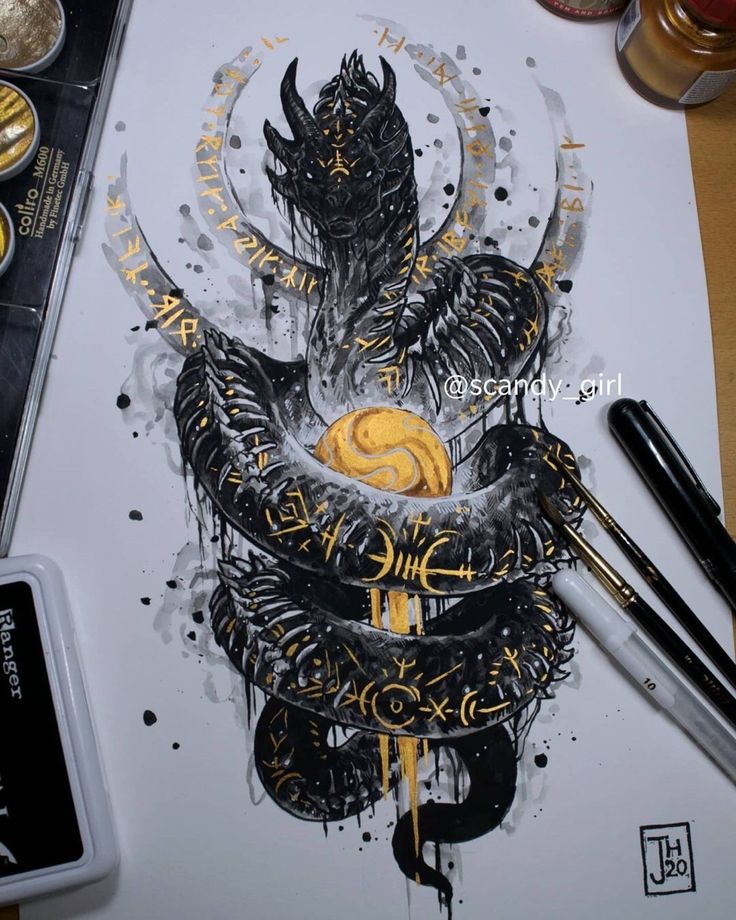 an image of a dragon with gold and black ink