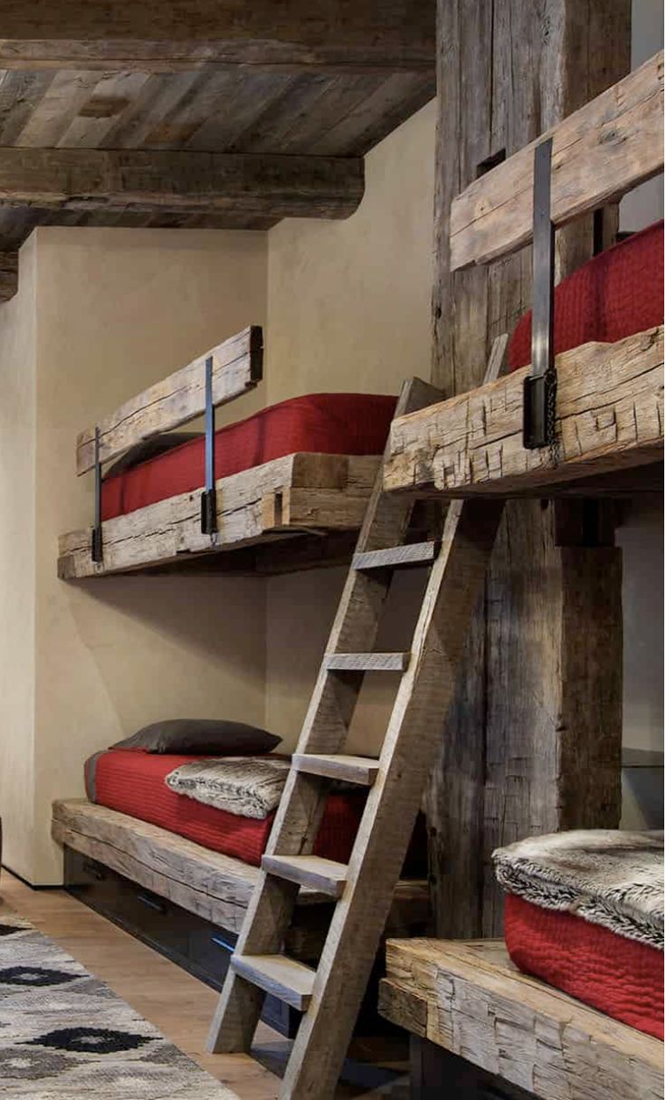 the bunk beds are made from wood and have ladders to keep them out of the room