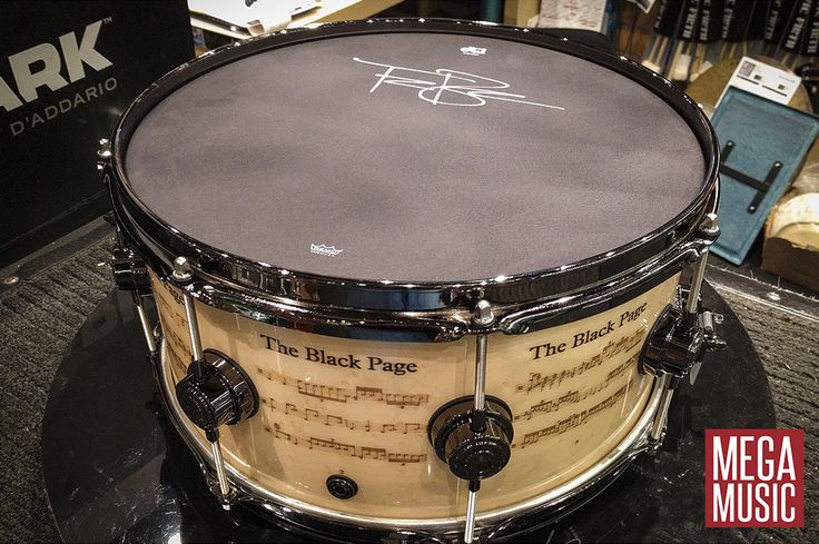 a close up of a drum with writing on it