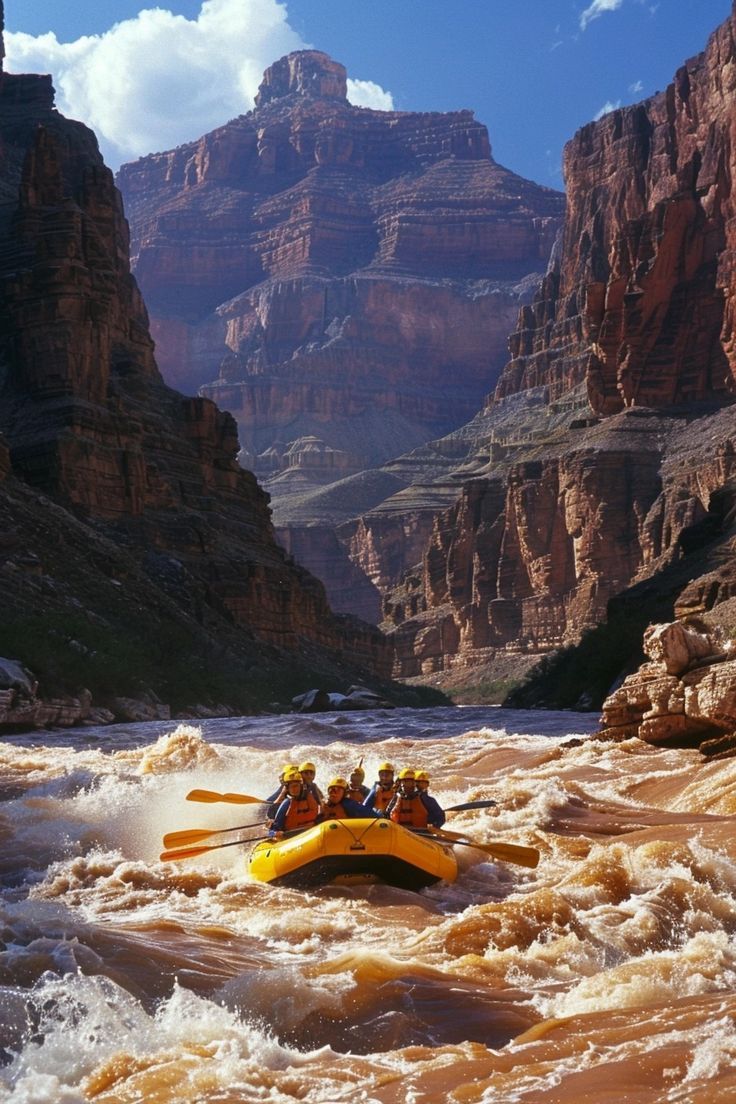 a group of people riding on top of a raft in the middle of a river