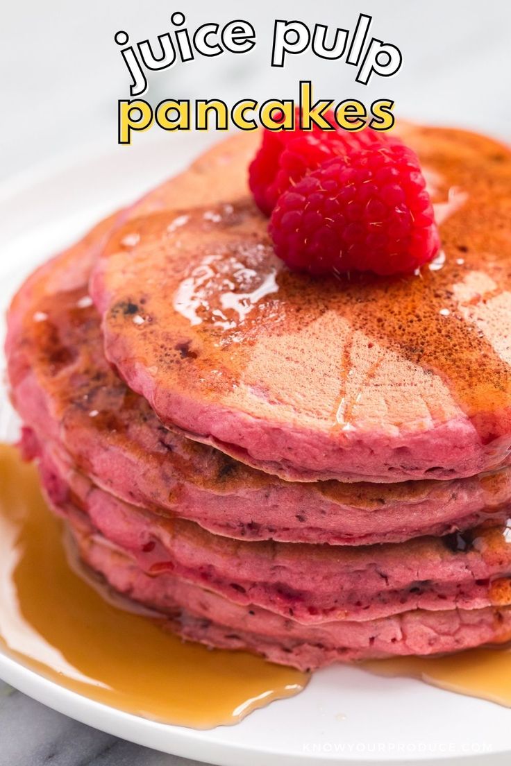 a stack of pancakes with syrup and a raspberry on top that says, juice pulp pancakes