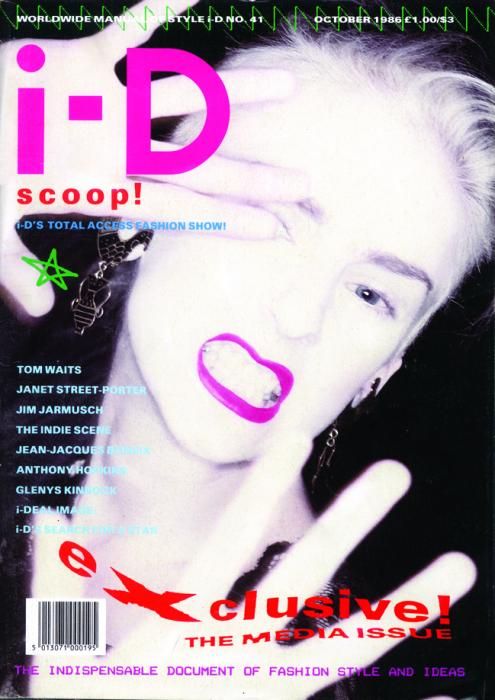 a magazine cover with a woman making the middle finger sign