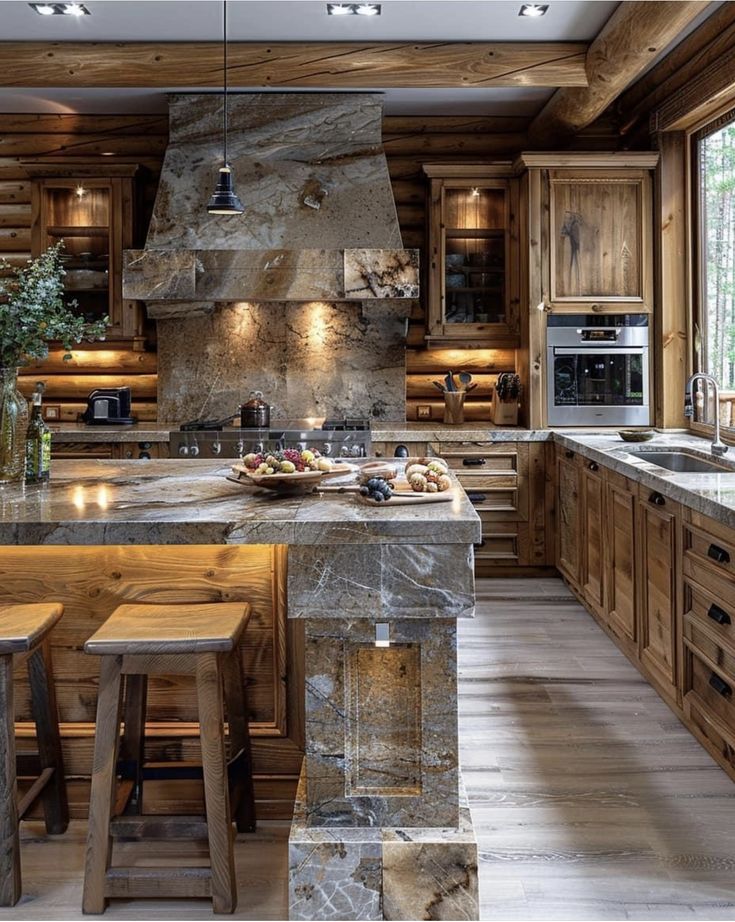 a large kitchen with an island in the middle and wooden cabinets on both sides, surrounded by wood flooring