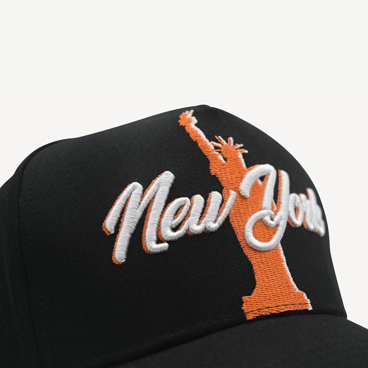 Gold Presidents New York Hat in Black, embroidered with orange and white stitching featuring the statue of liberty as the center piece. Classic trucker hat White thread embossing One size fits most Curved bill Adjustable snapback feature Shipping EXPRESS (3 - 5 days) UPS STANDARD (4 - 7 days) FREE (7 - 14 days) New York Hat, 10k Gold Chain, Picture Necklace, Mens Earrings Hoop, The Statue Of Liberty, Black Snapback, Gold Rope Chains, Gold Chains For Men, Solid Gold Earrings