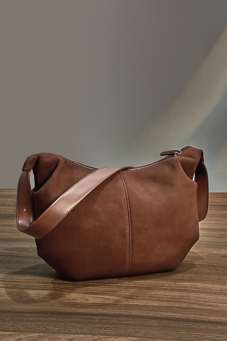 The Brown Faux Leather Shoulder Bag combines style with practicality, offering a rich hue and ample space for all your essentials. Product code: CAC12F4H003JJ Features:  Material: 100%POLYURETHANE. Brown Hobo Bag With Zipper For Office, Brown Hobo Bag With Zipper Closure For Office, Brown Large Capacity Faux Leather Hobo Bag, Modern Brown Soft Leather Bags, Modern Brown Shoulder Bag With Zipper, Modern Brown Shoulder Bag With Zipper Closure, Versatile Soft Leather Brown Bucket Bag, Solid Leather Shoulder Bag For On-the-go, Brown Faux Leather Shoulder Bag With Zipper