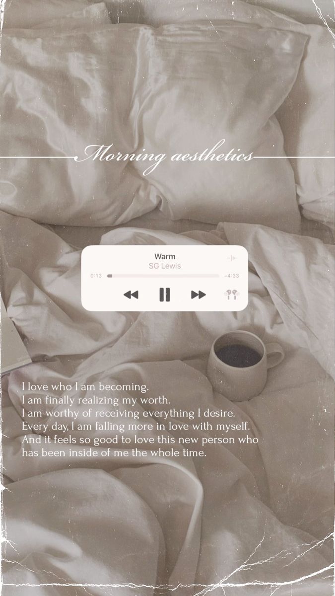 an image of a bed with white sheets and coffee cup on top of the pillow