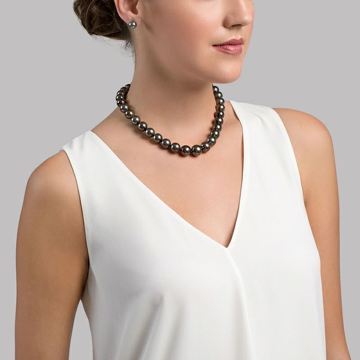 This exquisite one of a kind rare Peacock Tahitian South Sea pearl necklace features 12-14.2mm AAAA quality pearls hand-picked for their radiant luster and overtones.
This strand comes with an official GIA Certificate detailing the classification report and values of the strand. Multicolor Pearl Necklace, South Sea Pearl Necklace, Tahitian Pearl Necklace, Buy Necklace, Pearl Necklaces, Sea Pearl, Freshwater Pearl Necklace, South Seas, South Sea Pearls