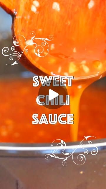 an orange being poured into a saucepan with the words sweet chili sauce on it