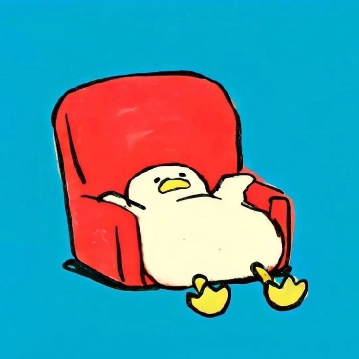 a cartoon penguin sitting in a red chair