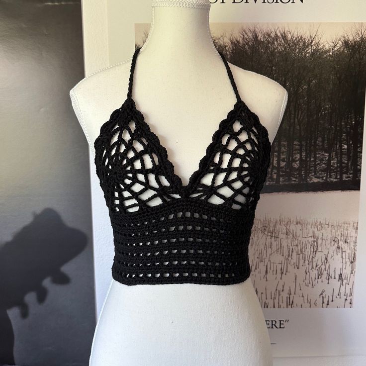 Black Cropped Fitted Bra, Fitted Cropped Black Bra, Black Fitted Cropped Bra, Gothic Crop Top For Festivals, Black Hollow Out Crop Top For Summer, Black Triangle Crop Top For Festival, Black Bra Friendly Crop Top, Black Bohemian Halter Top For Party, Black Triangle Top Crop Top For Festival