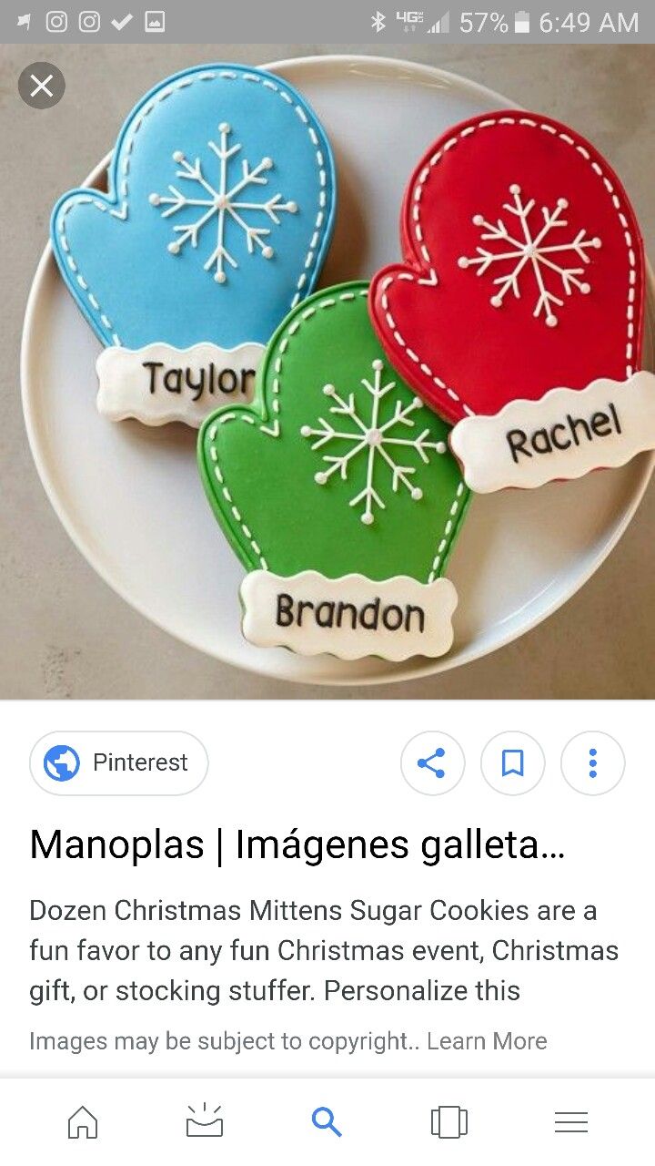 three decorated cookies sitting on top of a plate next to an email message that reads, manopia imagines galettea