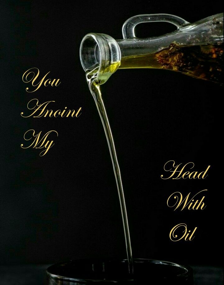 a bottle pouring oil into a cup with the words, you amount my head with oil