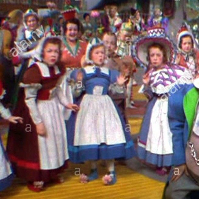 several people in costume are standing together