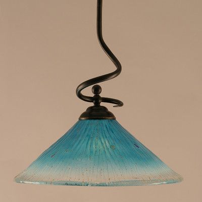 a blue glass hanging light with a black metal hook on the bottom and a white wall behind it