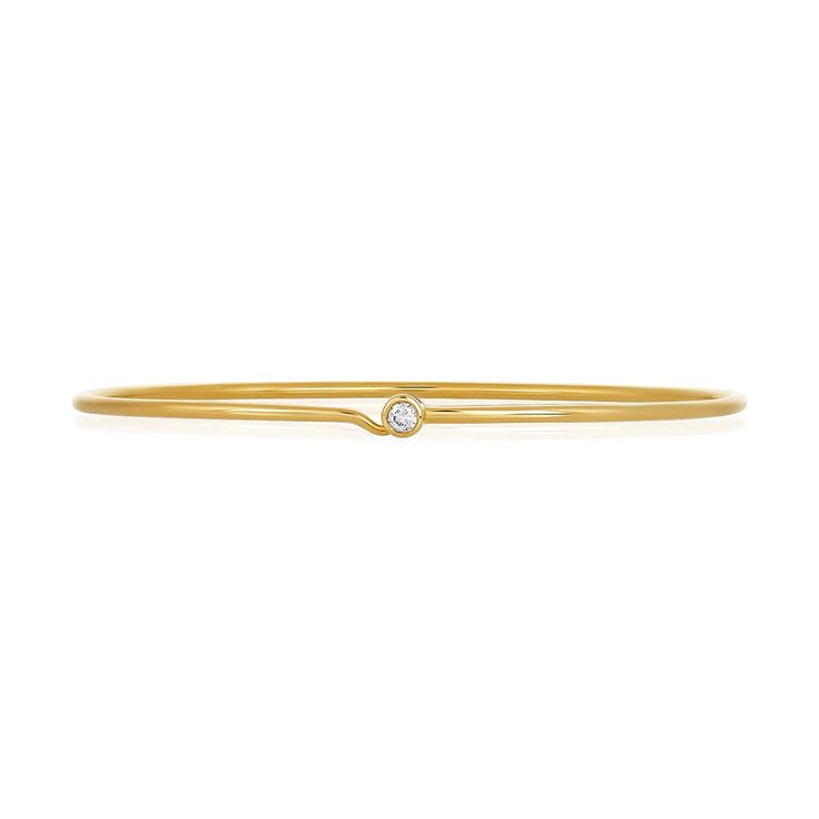 We love this dainty cuff with the perfect pop of sparkle! Bezel Set Diamond Bangle Bracelet, Everyday Bangle Bracelet With Single Diamond, Dainty Bangle Bracelets With Single Cut Diamonds, Elegant Cuff Bracelet With Single Diamond Gift, Dainty Single Diamond Bangle Bracelet, Dainty Bangle Bracelet With Single Diamond, Elegant Bezel Set Bangle Bracelet, Elegant Bangle Bracelet With Bezel Setting, Single Diamond Bangle