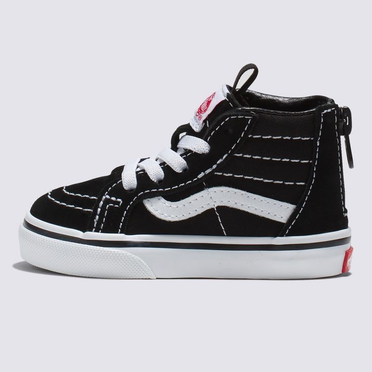 Our Legendary Sk8-Hi with Heel Zippers for Easy In And OutThe Sk8-Hi was a game changer as the first high-top skate shoe to break onto the scene in 1978. But the innovation didn’t stop there. Combining this legendary silhouette with a zipper entry at the heel for increased versatility, the Toddler Sk8-Hi Zip blends bold design with easy access for an iconic style like no other. Legendary high top, Sidestripe™ shoe made for toddlers Zipper entry at the heel Lace-up front closure Durable suede and Vans High-top Canvas Shoes, Black Mid-top Canvas Shoes For Skateboarding, Vans Black Sneakers For Skating, Sporty High-top Skate Shoes, Black High-top Vans Canvas Shoes, Vans High-top Skate Shoes, Vans High-top Skate Shoes With White Sole, Vans Skate Shoes For Skating, Vans Round Toe Skate Shoes