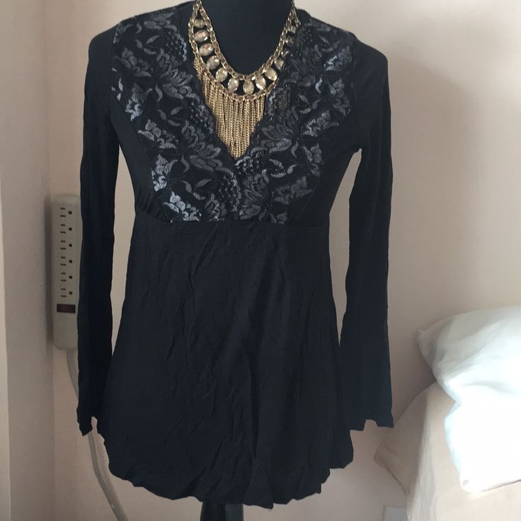 Black V-Neck Lace Detail Long Sleeve Shirt. Nwot 100% Nylon Black V-neck Top For Night Out, Black V-neck Blouse For Layering, Long Sleeve V-neck Top For Fall Party, Fall Party Long Sleeve V-neck Top, Casual Black V-neck Top For Fall, Long Sleeve V-neck Top For Night Out In Fall, Long Sleeve V-neck Top For Fall Night Out, Chic Black Stretch V-neck Top, Black V-neck Blouse For Night Out