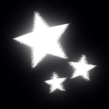 three white stars in the dark on a black background