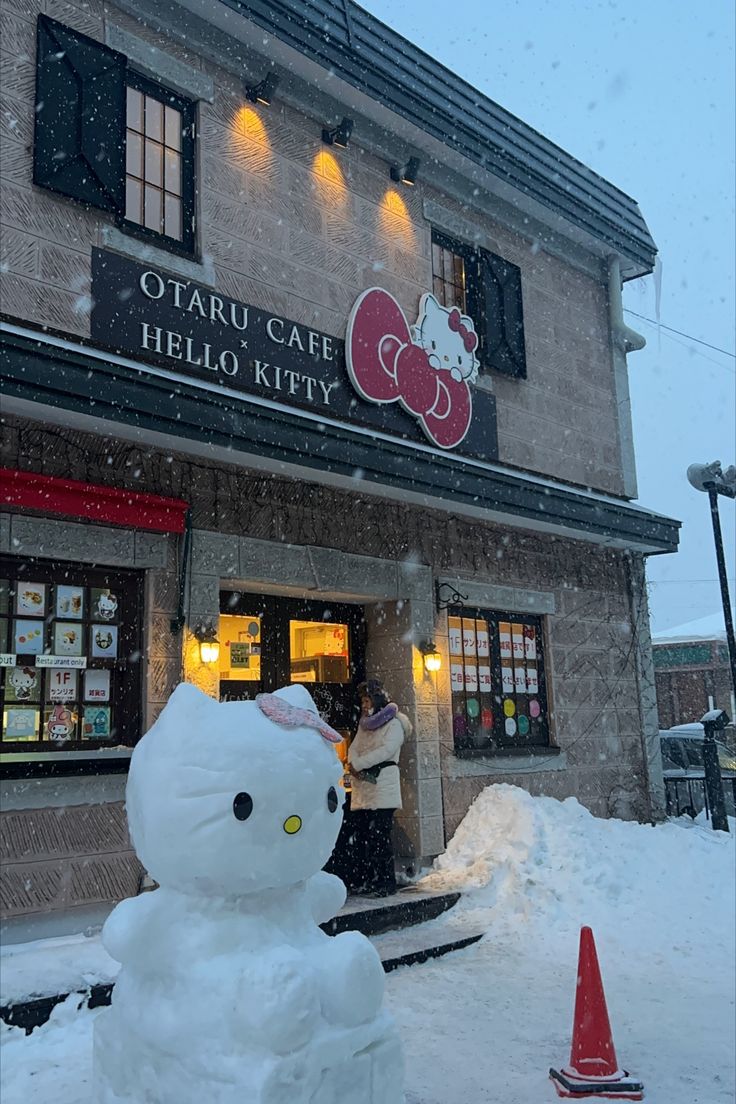 the hello kitty store is covered in snow