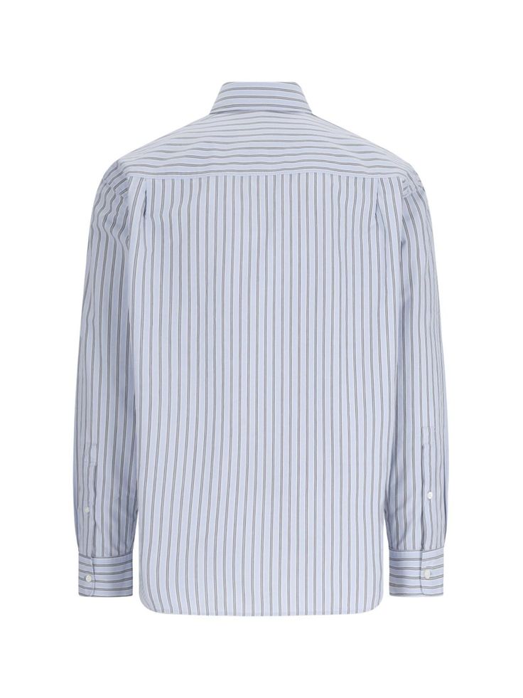 Closed striped shirt in light blue cotton with black stripe pattern, classic collar, button closure, logo embroidery on the chest, button cuffs, curved hem. Composition: 100% organic cottonSize and Fit: loose product made from organic materials Blue Cotton Shirt With Signature Stripes, Blue Cotton Shirt With Striped Cuffs, Blue Cotton Shirt With Contrast Stripes, Blue Shirt With Signature Stripes For Work, Cotton Button-up Shirt With Signature Stripes, Pinstripe Cotton Shirt For Work, Collared Cotton Shirt With Signature Stripes, Pinstripe Cotton Shirt With Striped Collar, Striped Cotton Shirt For Work