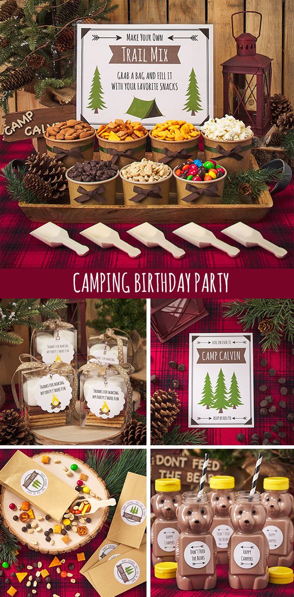 an outdoor camping birthday party with food and decorations