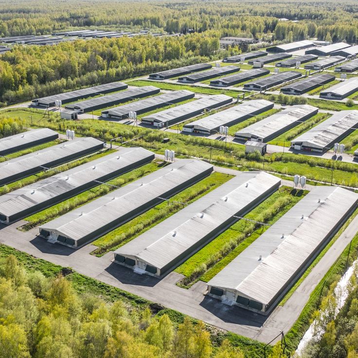 an aerial view of several large industrial buildings