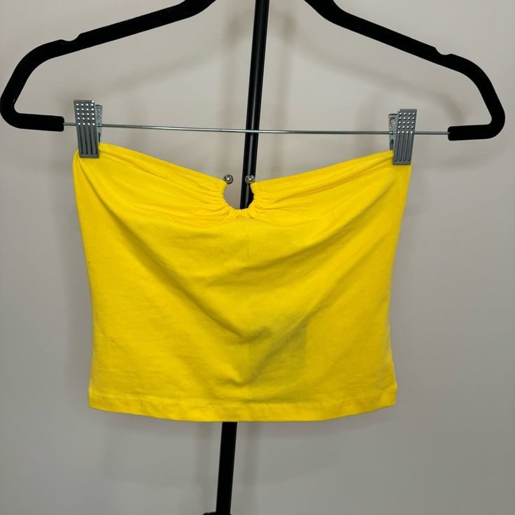 Brand New With Original Tag Never Worn Cropped Tube Top U-Ring Hardware Ruched Detail Stretch 95% Cotton 5% Spandex Yellow Seamless Summer Top, Casual Yellow Seamless Tops, Trendy Yellow Sports Top, Yellow Stretch Crop Top, Yellow Cotton Workout Top, Fitted Yellow Seamless Crop Top, Yellow Workout Tops For Summer, Yellow Seamless Workout Tops, Summer Workout Yellow Tops