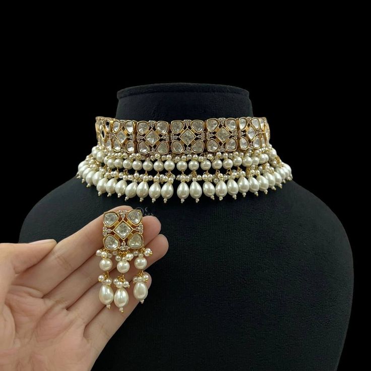 A Gift for someone most adorable for you. Suitable for all kind of outfits like lehenga, dresses, sarees . Necklace : 1 Earring:  1 Pearl Necklace For Diwali Party, Party Pearl Necklace For Diwali, Bollywood Style Choker Necklace For Diwali, Bollywood Style Choker Necklaces For Diwali, Bollywood Choker Necklaces For Diwali, Bollywood Style Festive Necklace With Gota Work, Party Kundan Necklace With Gota Work In Temple Style, Party Temple Jewelry Kundan Necklace With Gota Work, Festive Pearl Choker Necklace For Party