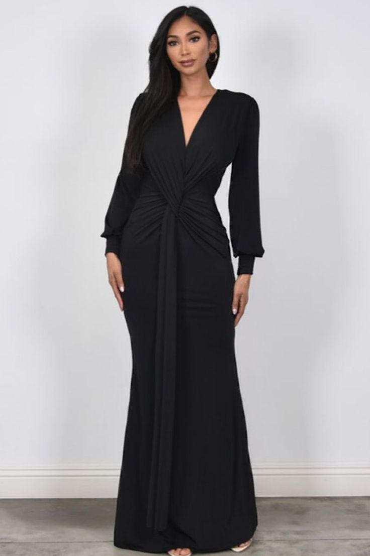 Beautiful Black Long Style Dress Beautiful black long stretchy spandex dress. Dress is designed to fit every curve. This is a form fitted curve hugging dress made with spandex. Plenty of stretch and the fabric is medium weight poly spandex blend. Plunging neckline you can easily pin close or wear open. Ruching detail for a figure flattering look. Long sleeves. V-neck Elastane Bodycon Dress With Flattering Silhouette, V-neck Elastane Bodycon Dress, V-neck Stretch Bodycon Evening Dress, Black Ruched Maxi Dress In Elastane, V-neck Ruched Stretch Maxi Dress, V-neck Stretch Maxi Dress With Ruched Details, Sleek Black V-neck Maxi Dress, Stretch Maxi Dress For Date Night With Flattering Silhouette, Stretch Maxi Dress With Flattering Silhouette For Evening