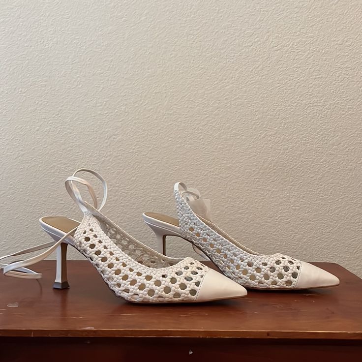 White Woven Leather Pumps. Never Worn. White Ankle Strap Heels In Faux Leather, Spring Faux Leather Closed Toe Heels, Chic White Faux Leather Heels, White Faux Leather Heels With 4-inch Heel, White Flat Heels For Spring, White Flats For Spring, White Flat Heels For Fall, Casual Cream Heels For Evening, White Medium Width Lace-up Heels