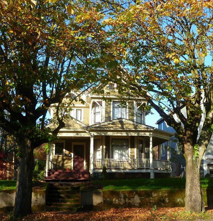 a house with trees in front of it