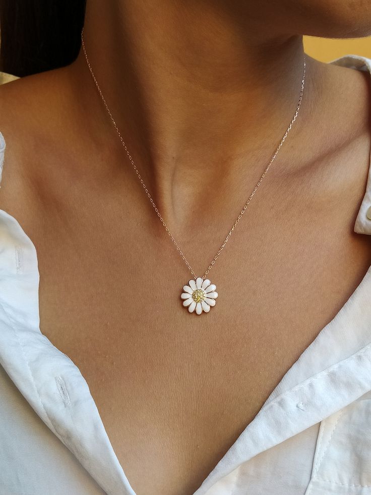 A perfect daisy gift to your girlfriend, daughter, wife, friend or even to your bridesmaid 🌼 Get this beautiful minimalist jewelry made with the quality of perfect elements✨ You can choose 925K Sterling Silver with the options of Gold, Rose Gold or White Gold colors as well as 14K solid Gold material. High quality jewelry for everyone 🤍 Details * 925K Sterling Silver Option → 14K Gold, Rose Gold or White Gold plated * 14K Gold Option → approximately 3.90 gram * Chain length is approximately 18 inches (16+2 in extender) / 45 cm (40+5 cm extender) * Time is everything! You will receive your package as soon as possible 🚚 * We care about the quality of metal to make sure it will last for a long time * We use enamel technique to color the jewelry and high quality zircons only * There can be Elegant White Flower Necklace With Birth Flower Detail, Elegant White Flower Necklace For Birth Month, Elegant White Flower Necklace For Birthdays, Elegant White Birth Flower Necklace, Dainty Daisy Sterling Silver Jewelry, Elegant Daisy Flower Charm Jewelry, Elegant Daisy Shaped Jewelry, Elegant Daisy-shaped Gift Jewelry, Delicate White Daisy-shaped Jewelry