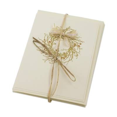 an open book with a ribbon tied around it