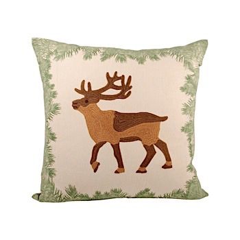 a decorative pillow with an image of a deer