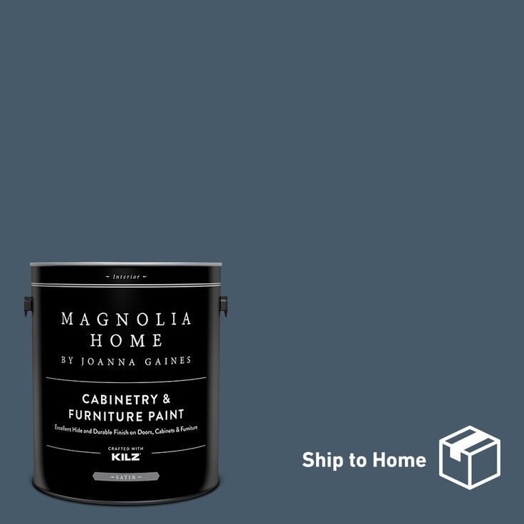 a can of paint with the words magnolia home painted on it and an image of a house