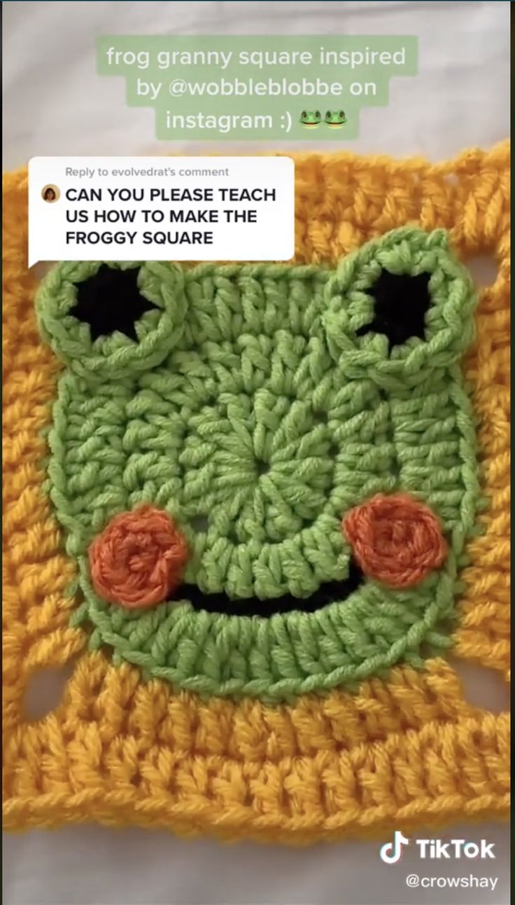 a crocheted square with a face drawn on it and the words can you make this frogy square?